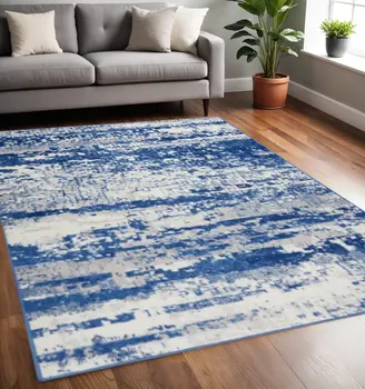 5' X 7' Ivory And Blue Ombre Distressed Area Rug