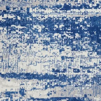 6' X 9' Ivory And Blue Ombre Distressed Area Rug
