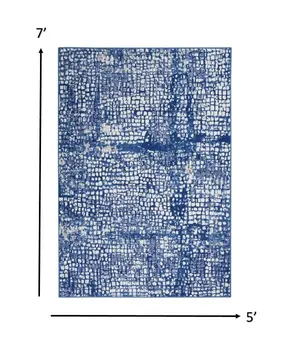 5' X 7' Ivory And Blue Geometric Area Rug