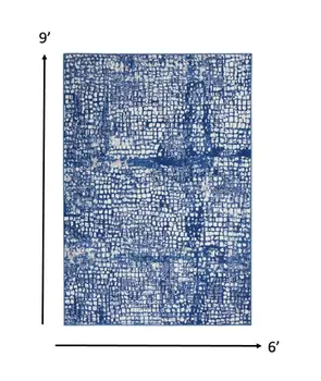 6' X 9' Ivory And Blue Geometric Area Rug