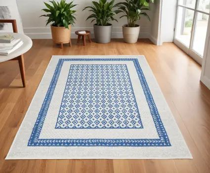 4' X 6' Ivory And Blue Geometric Area Rug