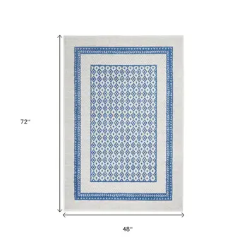 4' X 6' Ivory And Blue Geometric Area Rug