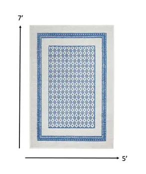 5' X 7' Ivory And Blue Geometric Area Rug