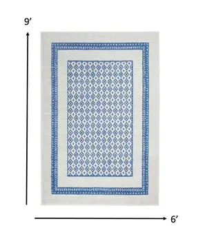 6' X 9' Ivory And Blue Geometric Area Rug