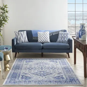 4' X 6' Ivory And Blue Geometric Distressed Area Rug