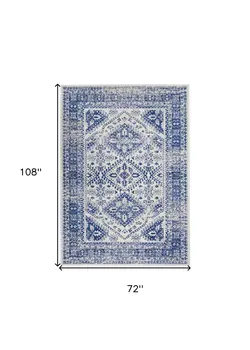 6' X 9' Ivory And Blue Geometric Distressed Area Rug