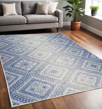 5' X 7' Ivory And Blue Geometric Area Rug