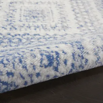 5' X 7' Ivory And Blue Geometric Area Rug
