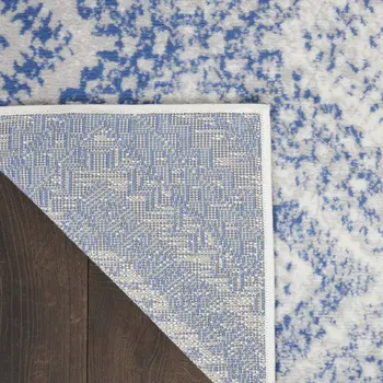 6' X 9' Ivory And Blue Geometric Area Rug
