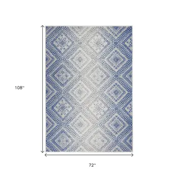 6' X 9' Ivory And Blue Geometric Area Rug