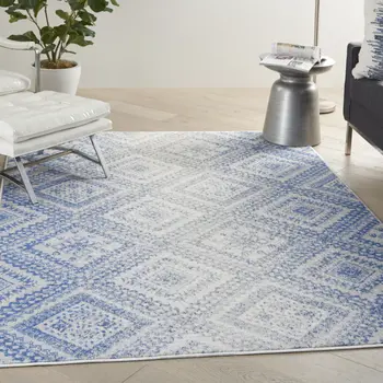 6' X 9' Ivory And Blue Geometric Area Rug