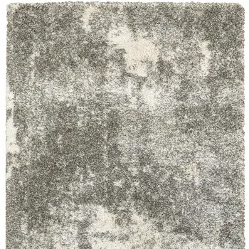 5' X 8' Gray And Ivory Distressed Abstract Area Rug