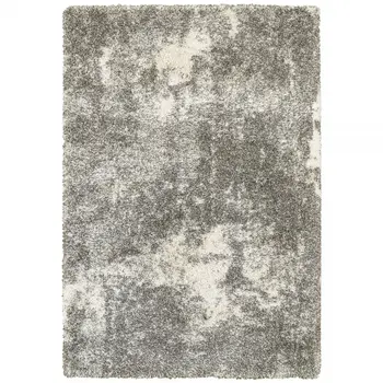 5' X 8' Gray And Ivory Distressed Abstract Area Rug