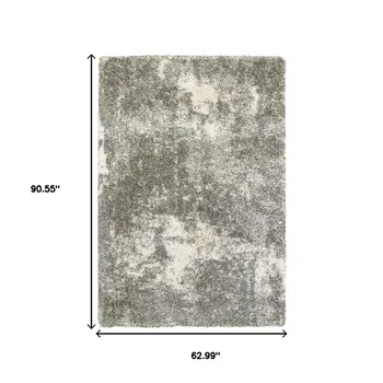 5' X 8' Gray And Ivory Distressed Abstract Area Rug
