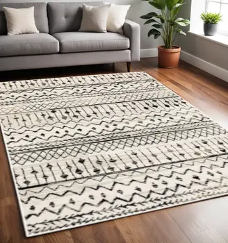 5' X 7' Ivory And Black Abstract Geometric Distressed Area Rug