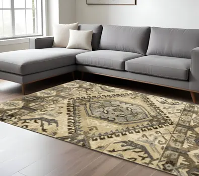 7' X 10' Tan And Gold Medallion Area Rug