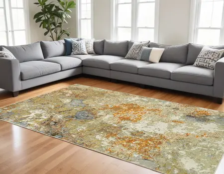 7' X 10' Gold and Ivory Power Loom Area Rug