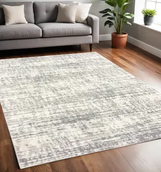 5' X 8' Ivory And Gray Abstract Strokes Area Rug