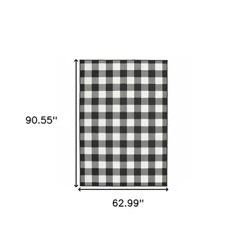 5' X 8' Black And Ivory Indoor Outdoor Area Rug