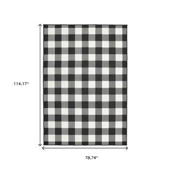 7' X 10' Black And Ivory Indoor Outdoor Area Rug