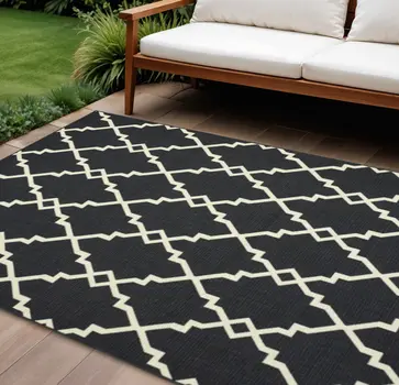 7' X 10' Black And Ivory Indoor Outdoor Area Rug