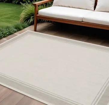 7' X 9' Gray And Ivory Indoor Outdoor Area Rug