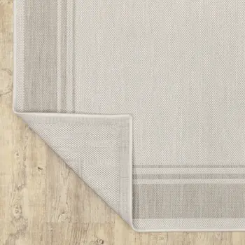 7' X 9' Gray And Ivory Indoor Outdoor Area Rug