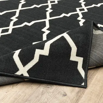 2' X 4' Black And Ivory Indoor Outdoor Area Rug