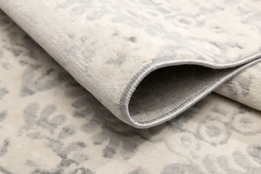 5' X 8' Ivory Distressed Ikat Pattern Area Rug