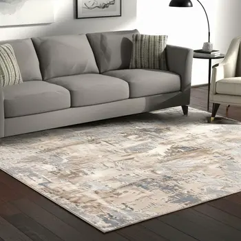 5' X 8' Beige And Ivory Abstract Area Rug