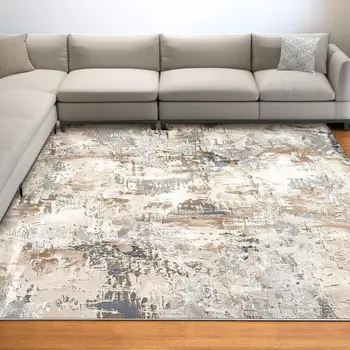 7' X 10' Beige And Ivory Abstract Area Rug