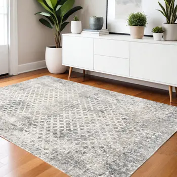 4' X 6' Gray And Ivory Distressed Area Rug