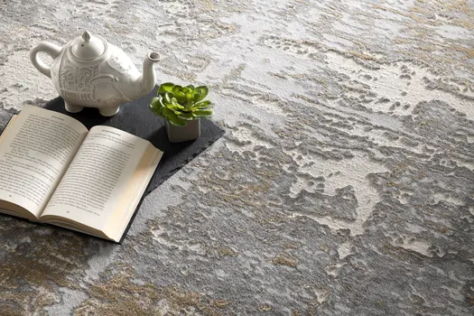 7' X 10' Beige And Gray Distressed Area Rug