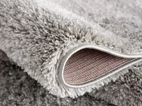 7' X 9' Ivory Modern Solid Shag Area Rug