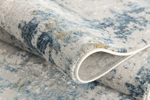 5' X 7' Blue and Ivory Abstract Area Rug