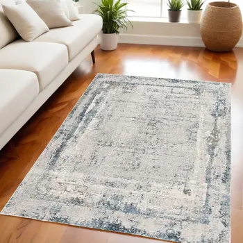 5' X 7' Blue and Ivory Abstract Area Rug