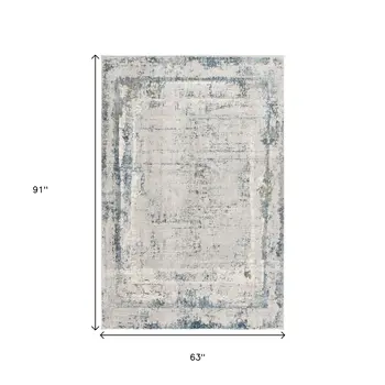 5' X 7' Blue and Ivory Abstract Area Rug