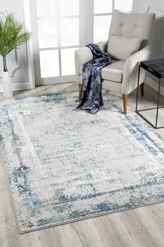 5' X 7' Blue and Ivory Abstract Area Rug