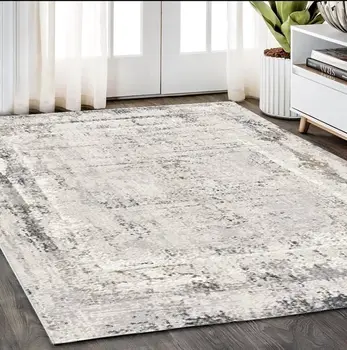5' X 8' Gray and Ivory Abstract Power Loom Area Rug