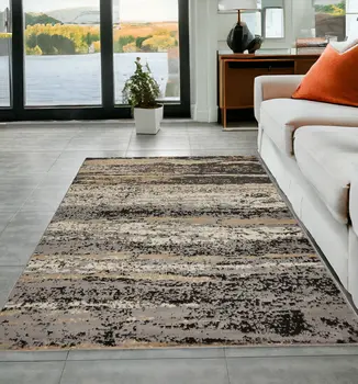 5' X 7' Beige Black And Gray Abstract Area Rug