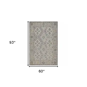 5' X 8' Blue and Tan Traditional Area Rug
