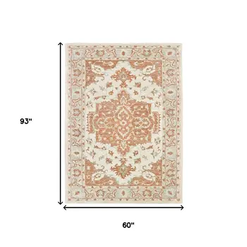 5' X 8' Orange and Ivory Medallion Area Rug