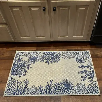 2' X 3' Beige and Blue Coral Stain Resistant Indoor Outdoor Area Rug