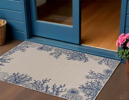 2' X 3' Beige and Blue Coral Stain Resistant Indoor Outdoor Area Rug