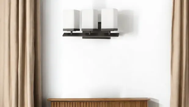 Three Light Bronze Frosted Glass Wall Sconce
