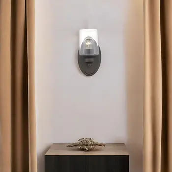 One Light Bronze Wall Light with Clear Glass Shade
