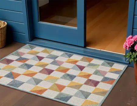 2' X 4' Orange And Ivory Geometric Stain Resistant Indoor Outdoor Area Rug