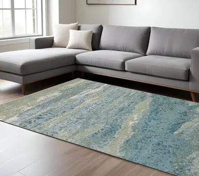 7' X 10' Blue And Sage Abstract Area Rug
