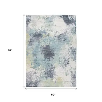 5' X 8' Blue and Ivory Abstract Area Rug