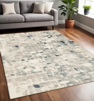 5' X 8' Blue and Beige Abstract Area Rug